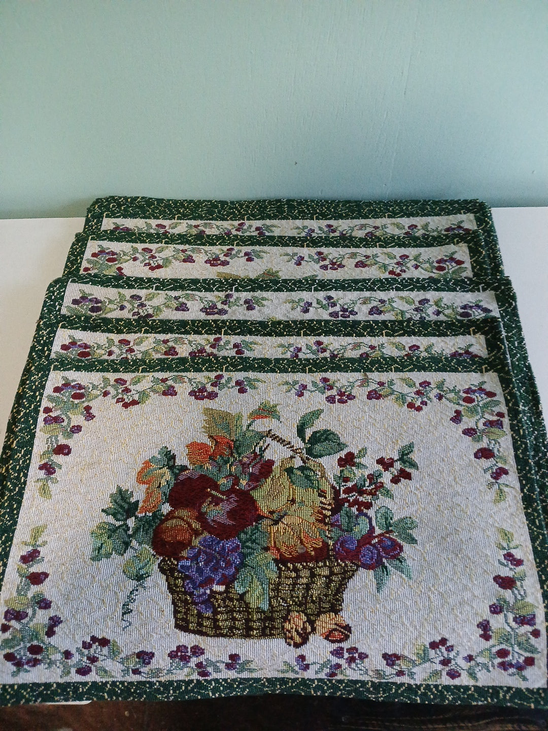 8 piece country placemat set . Fruit and flowers tapestry