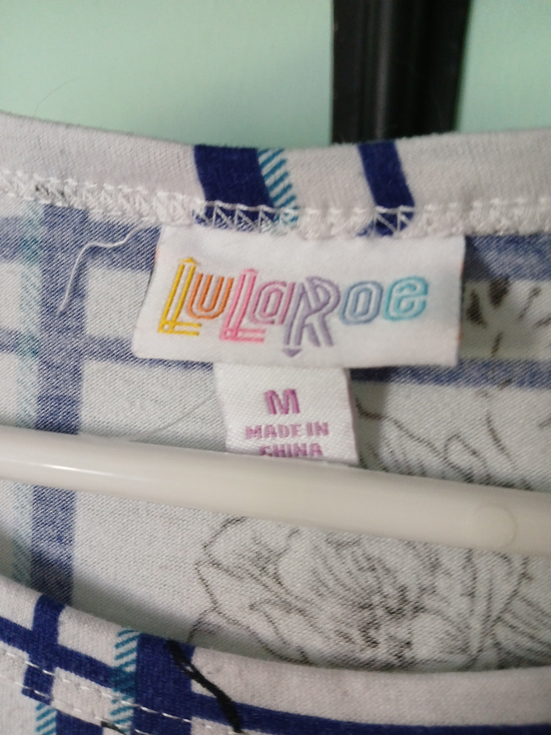 LULAROE dress with Pockets /White, Blue Squares, & Floral Sz M